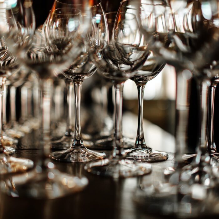 Serving on the table. Crystal glasses. Wedding. Banquet.